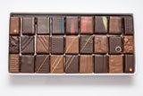 Coffret de chocolat T2 assortiment de 27 bonbons de chocolat.